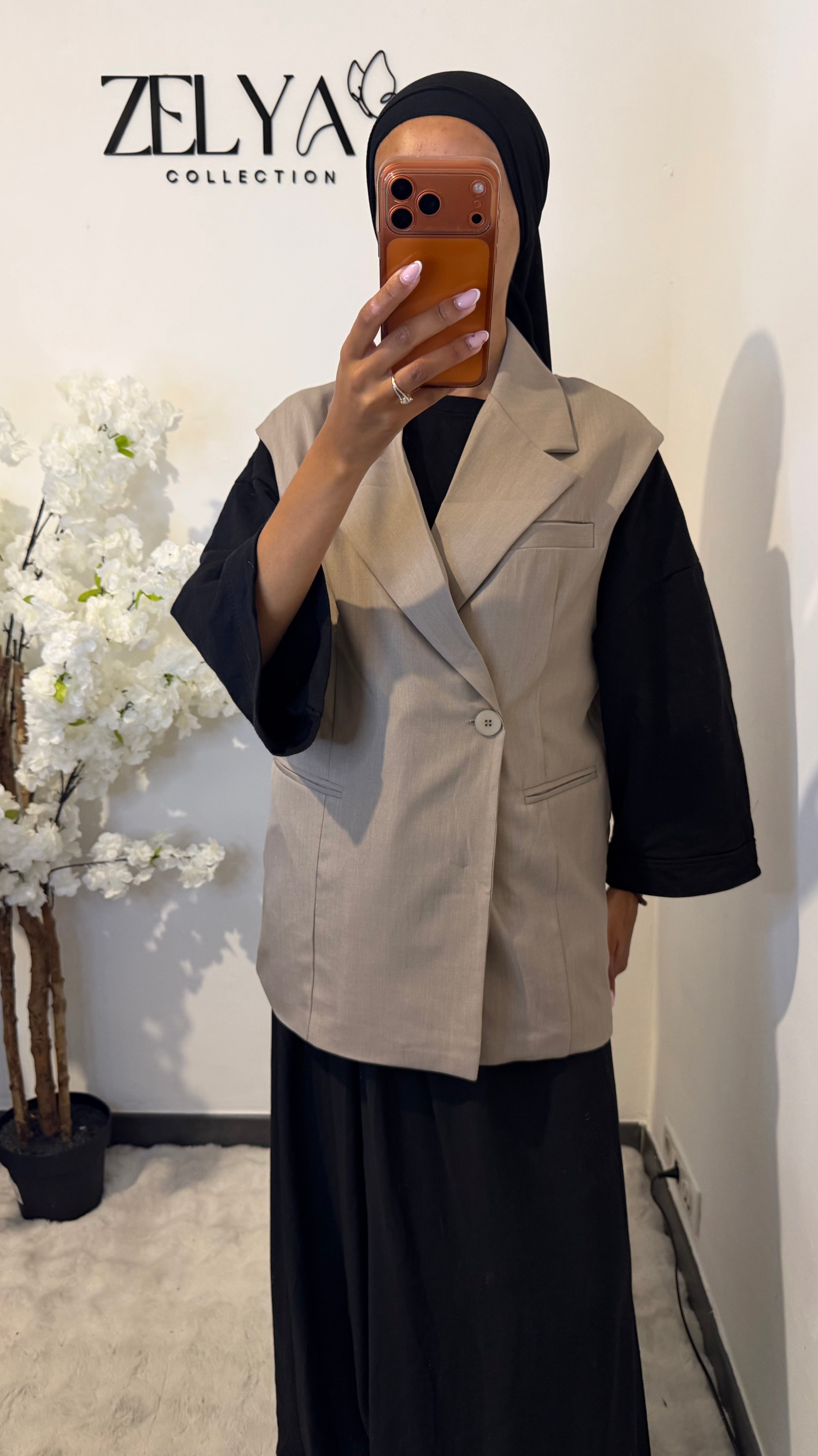 Blazer sans manches avec bouton