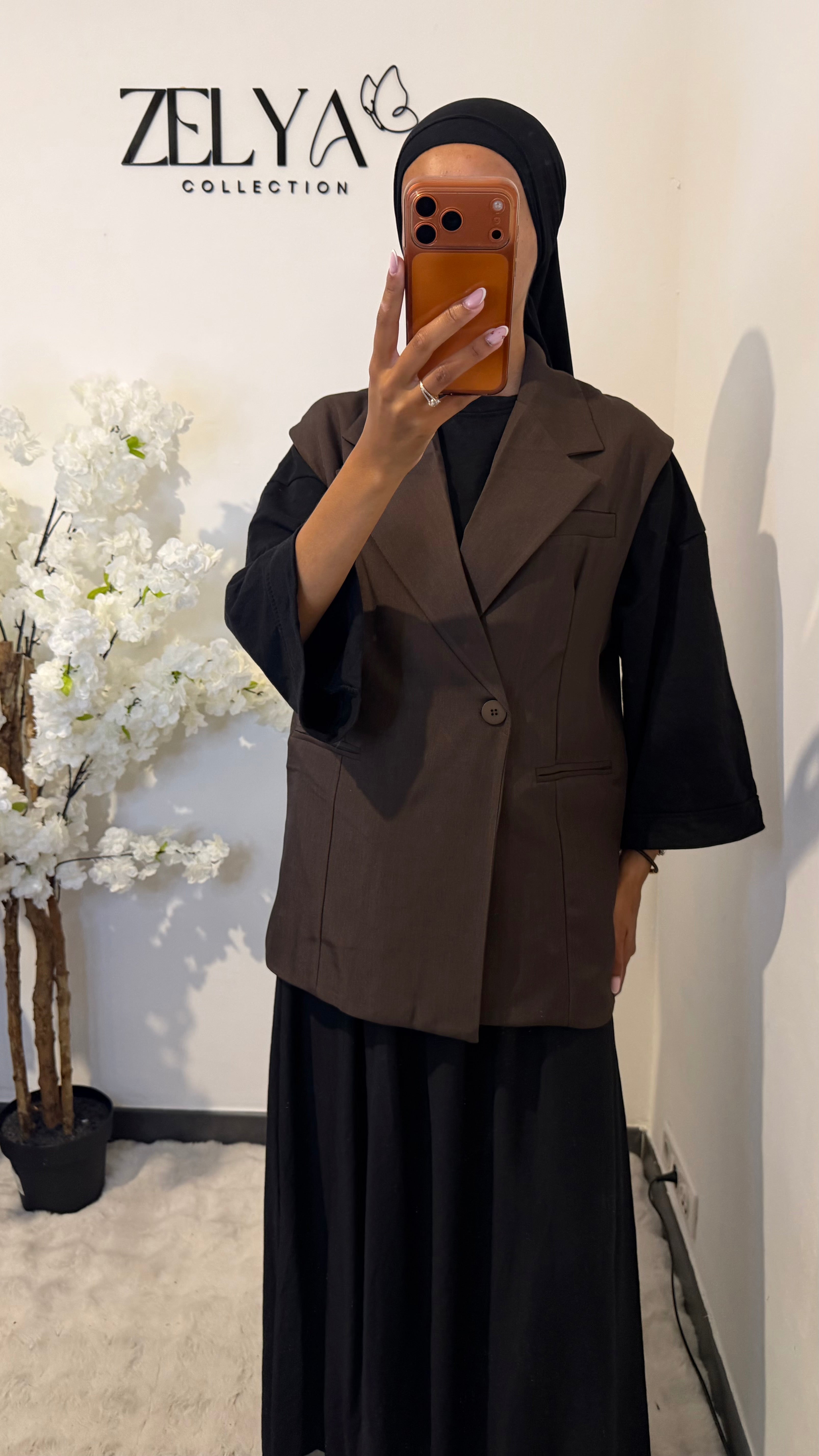Blazer sans manches avec bouton