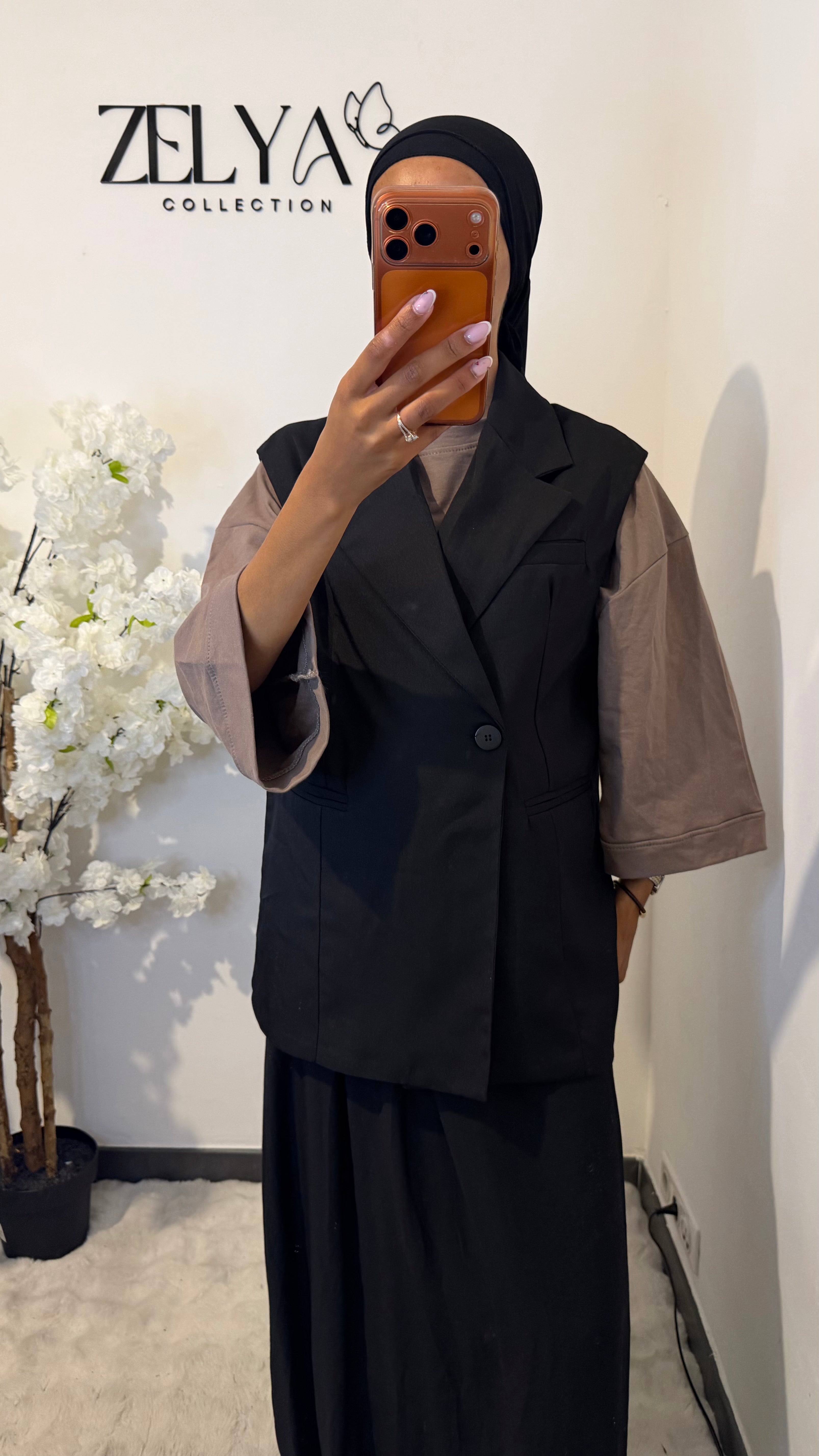 Blazer sans manches avec bouton