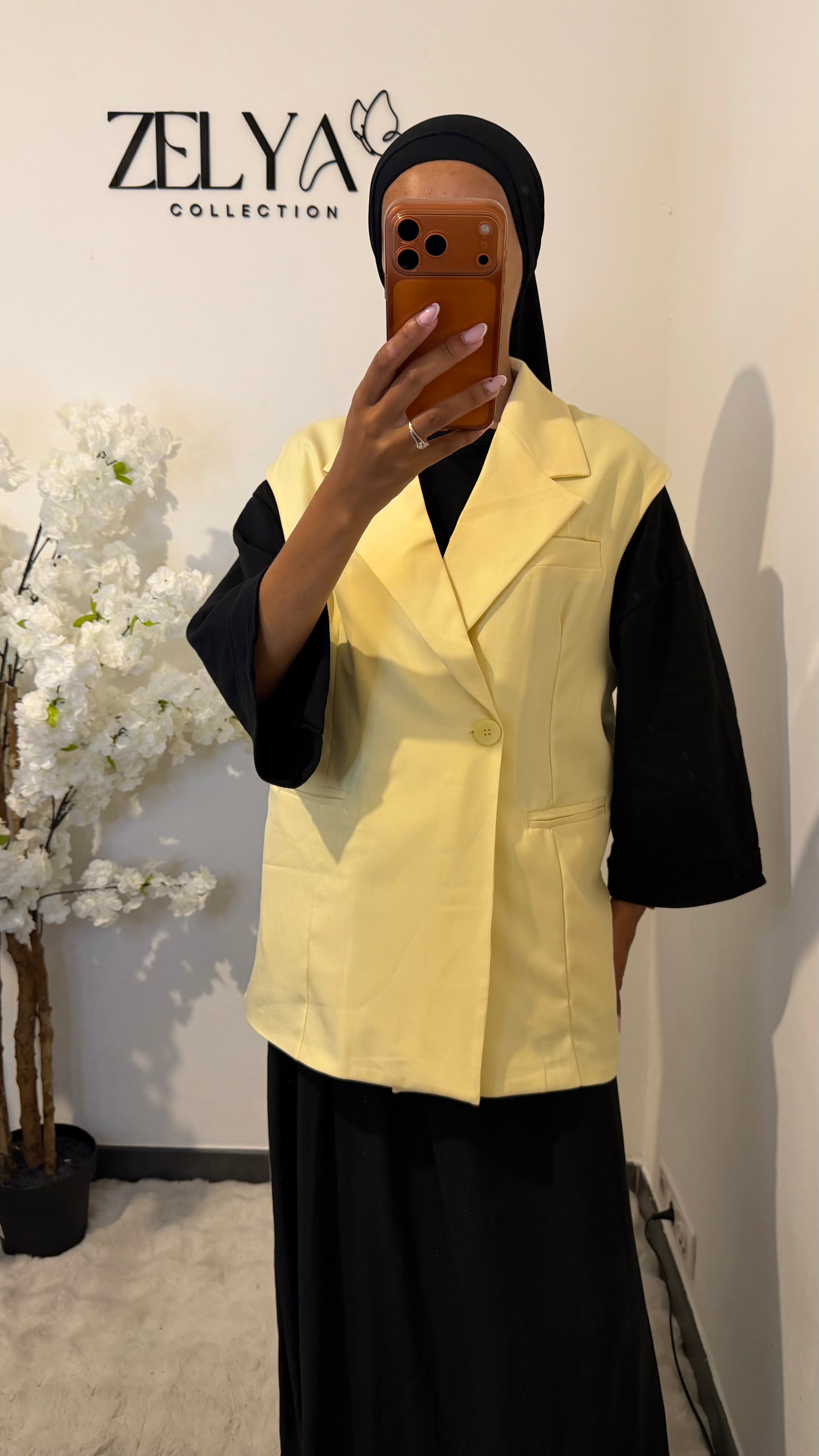 Blazer sans manches avec bouton